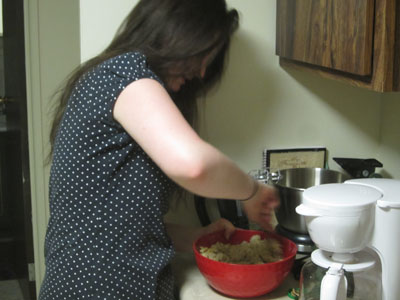 User mixing cookie dough.